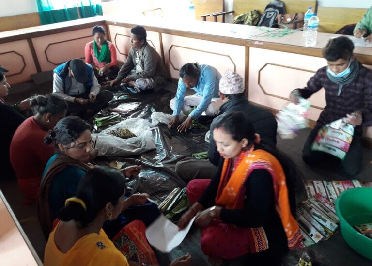 Women are making incense sticiks